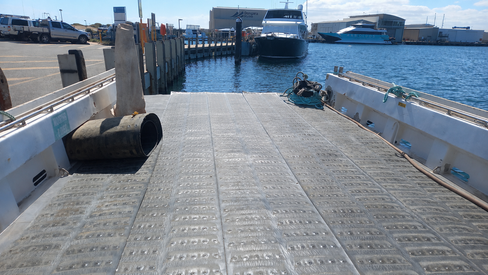 Barge bow ramp lowered alongside at Dongara Marine